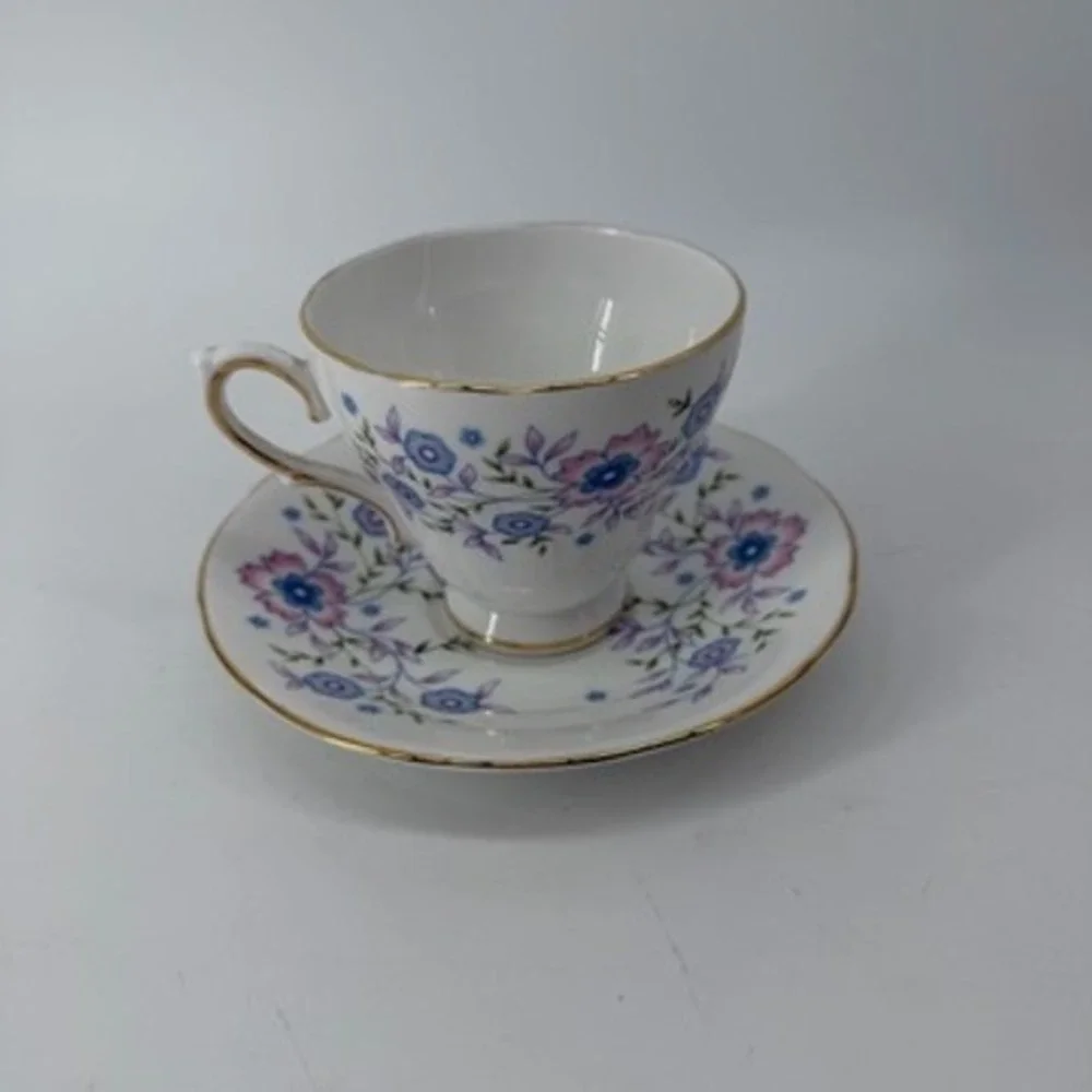 Avon Blue Blossoms Tea Cup and Saucer Set Fine Bone China England 1974 Vintage
